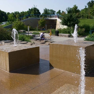 The water feature offers a fun way to cool down during the summer months