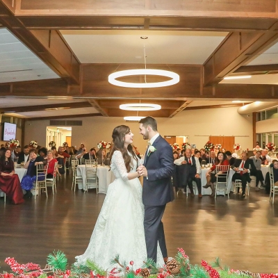 A couple shares their first dance on the dancefloor at an O'Day Lodge wedding.
